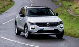 vw-t-roc-white-fromt-driving-1