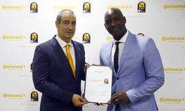 Image 1- Jon Ander Garcia (Continental) and Anthony Baffoe (Deputy General Secretary - CAF)