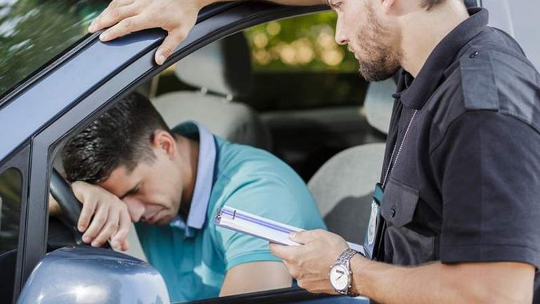 sad-man-in-car-104266937