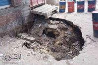 "هبوط أرضى" يتسبب فى ميل أحد العقارات بالمحلة