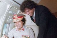 قذاف الدم مع الرئيس الراحل معمر القذافى