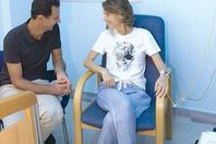 الأسد وزوجته أثناء تلقي جرعة علاج كيماوي