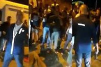 مرافق باسيل يرفع سلاحه ضد المتظاهرين