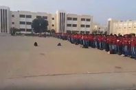 طلاب يؤدون صلاة الغائب