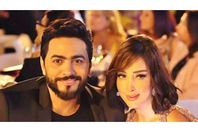 تارم حسني و زوجته  بسمة بوسيل