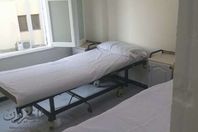 شقيقان يجهزان جناح بمستشفى حميات إسنا