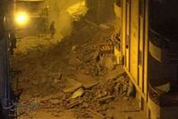 بالصور انهيار عقار وسط الإسكندريه