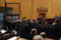  إعادة محاكمة متهم باقتحام قسم كرداسة