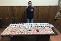 المتهم وبحيازتة المضبوطات