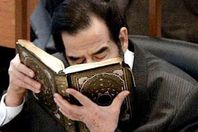 الأغرب في العالم .. نسخة من " القرآن" بدماء " صدام حسين"