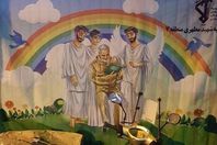 الملائكة تسبح حول "قاسم سليماني" .. جدارية بإيران