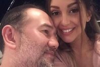 ملك ماليزيا السابق مع طليقته