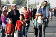 الهلال الأحمر التركي يواصل مساعدة النازحين من الموصل العراقية