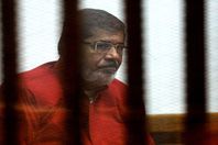 وصول مرسى إلى أكاديمية الشرطة