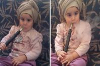 طفله تدخن الشيشة