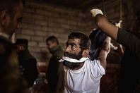 جانب من التعذيب