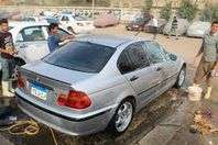 مغاسل السيارات  العشوائية تنتشر على الطرق الرئيسية بالبحيرة