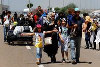 عودة نصف مليون سوري إلى بلادهم