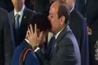 السيسى يقبل رأس الشاب ياسين زغبى
