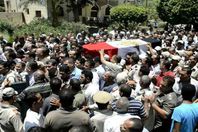 أرشيفية من تشييع جثمان الشهداء