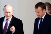 ماكرون      بوتين