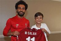 صلاح وطفل سوري