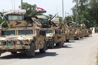 الأمن يحرر مطار الضلوعية من “داعش” ويرفع علم العراق