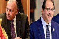 عباس كامل وسامح شكرى