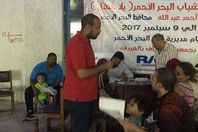 صورة توزيع الاستمارات  بمقر جمعية الشبان المسلمين بالغردقة