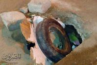 صورة غرفة الصرف الصحي مغطاه بكاوتش واحجار