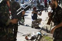 50 قتيلا و100 جريح حصيلة يوم دامٍ بطرابلس