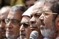 قيادي إخواني لمستشار مرسي : "لا طلنا بلح الشام ولا عنب اليمن"