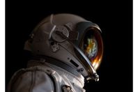 0_Close-Up-Of-Astronaut-Against-Black-Background
