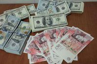 ضبط 700 ألف عملة أجنبية بحوزة3  أشخاص