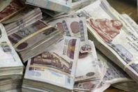 إحباط تهريب نقود مصرية بحوزة راكبة بمطار القاهرة