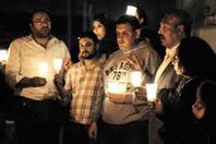 وقفة بالشموع لتأبين ذكرى شهداء ماسبيرو