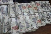 حبس محام ٤ أيام لاتهامه بحيازة أموال مزورة