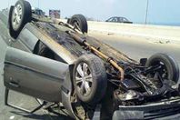 مصرع وإصابة 7 أشخاص في انقلاب سيارة أعلى الدائري