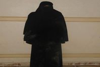 يتنكر في زى منتقبة للتحرش بالطالبات