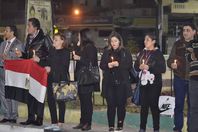 بالصور.. وقفة بالشموع ببورسعيد حدادًا على ضحايا الكاتدرائية