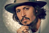 الحكم بإبعاد جوني ديب عن زوجته 