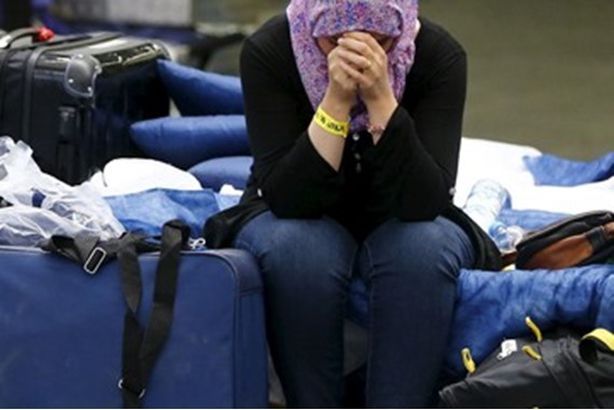 A-woman-crying-at-the-Refugee-Registration-Center-in-Frankfurt-Germany-September-2015-–-Reuters