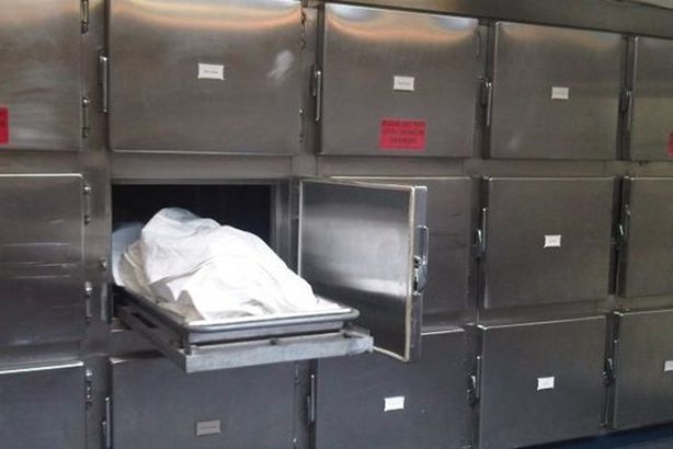 121-213501-iran-dead-woman-wakes-mortuary_700x400