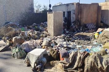 إزالة 50 طنا من النفايات المتراكمة في موقع بمنطقة كفرخل في جرش

