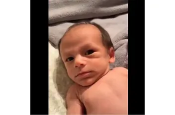 ق
