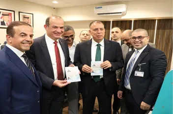 وزير الداخلية مازن الفراية، وبحضور وزير الاقتصاد الرقمي والريادة سامي سميرات ومدير عام دائرة الأحوال المدنية والجوازات غيث الطيب