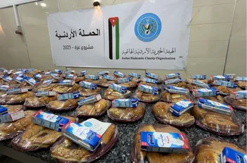وجبات الإفطار التي وزعتها الحملة الأردنية