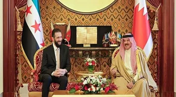 King of Bahrain Receives Syrian President Al-Shara
