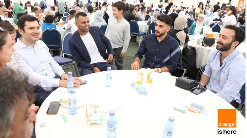 A vibrant and engaging atmosphere during Orange Jordan’s Family Day for employees