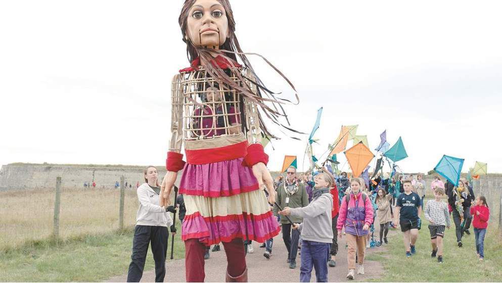 Four months, 5,000 miles A refugee puppet looks for home...